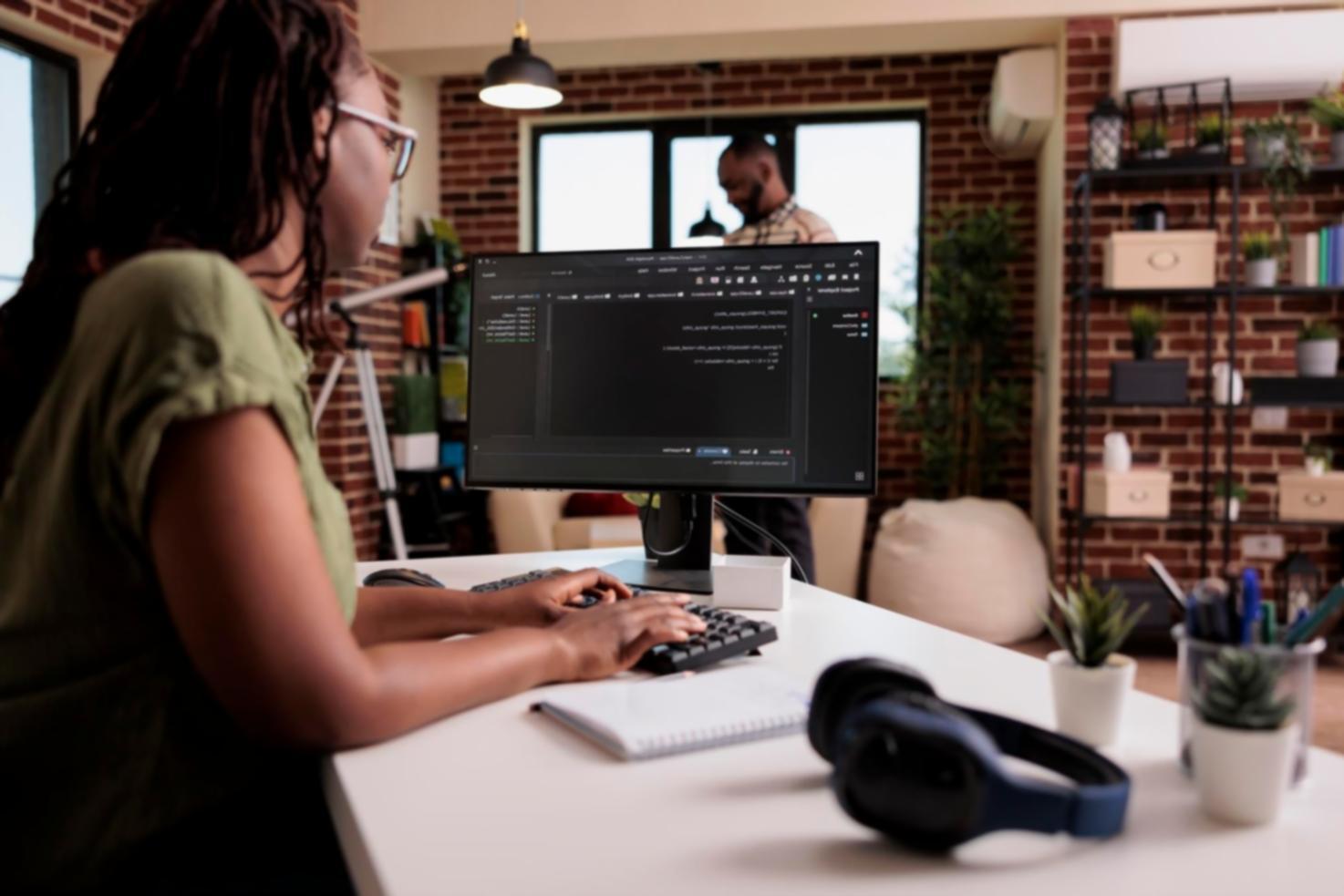 Interactive game development workshop with students working on live projects